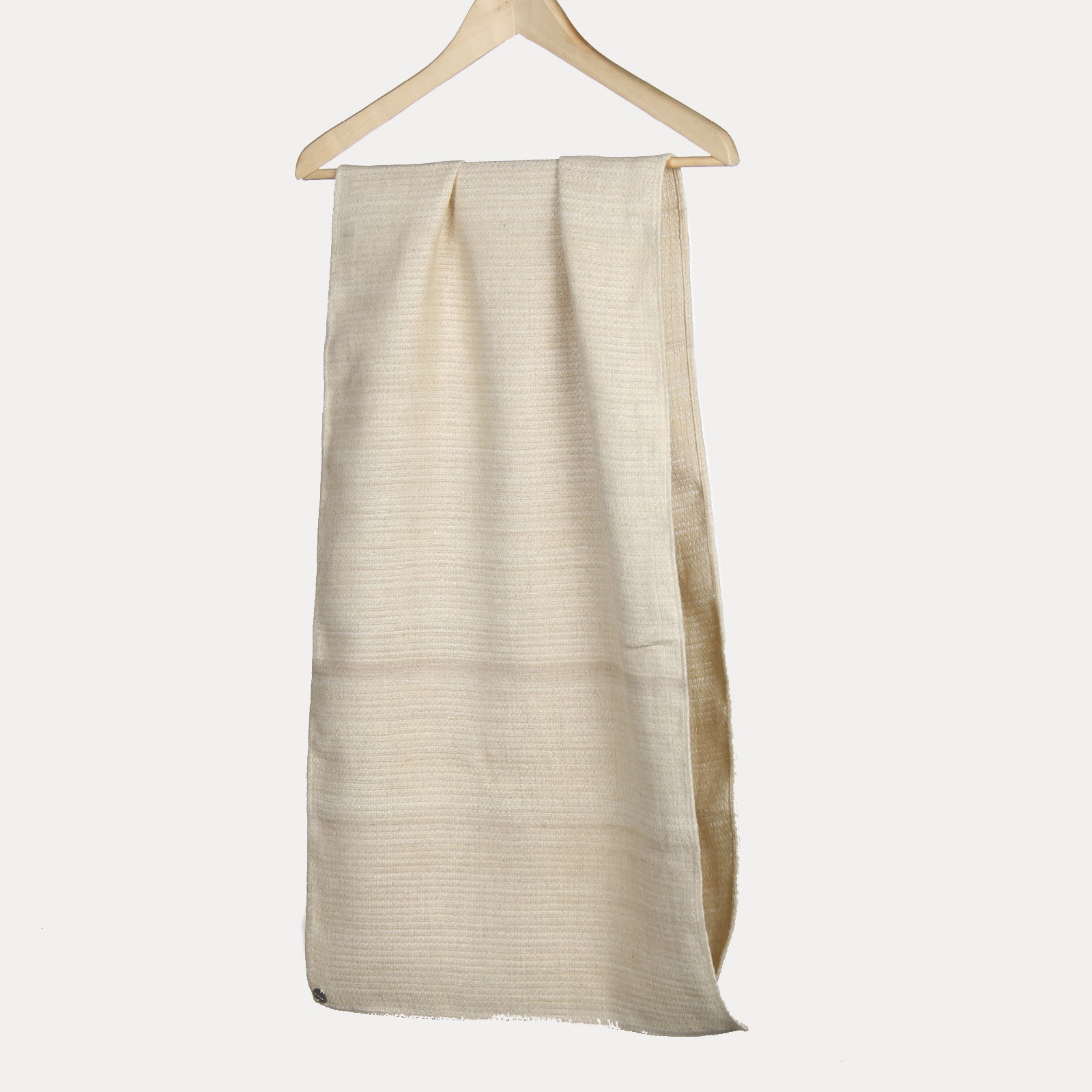Peace Silk silk scarf Sahira cream – on wooden hanger, horizontal ribbed texture