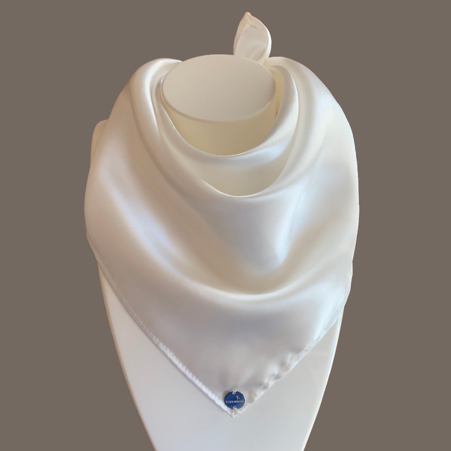 Peace Silk scarf satin natural white – as triangle around mannequin, highly glossy, grey background