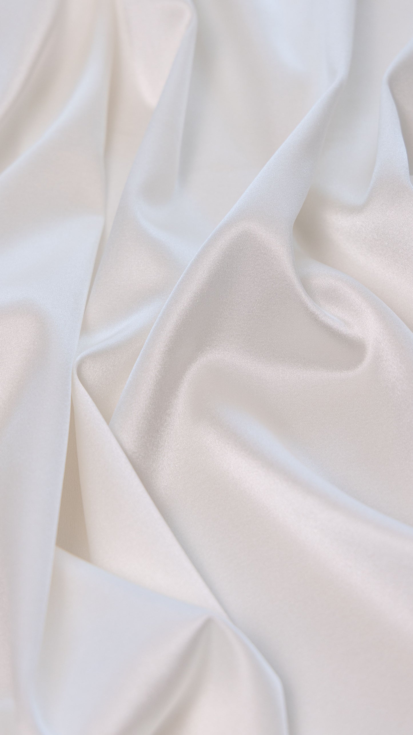 Seidenstoff für Brautkleider • Natürlicher Peace Silk Stretch-Satin • 95% Seide, 5% Elasthan • Naturweiß • Amita