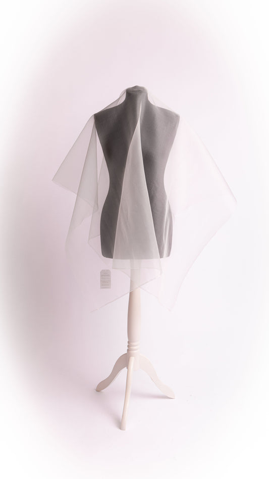 Peace Silk organza XL natural white – one-shoulder drape on grey mannequin, asymmetric fall