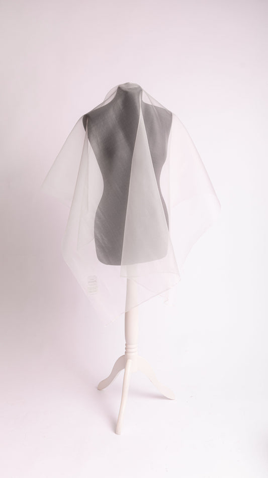 Peace Silk organza XL natural white – symmetric hood drape on grey mannequin, fabric falls to both sides